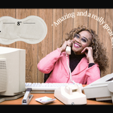 Woman in a pink jacket sitting at a desk with vintage phone and computer, with text about the size of Spicey heat patches.